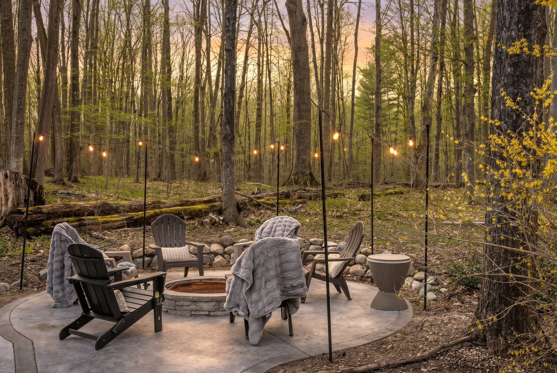 Fire pit at dusk at Birch + Still