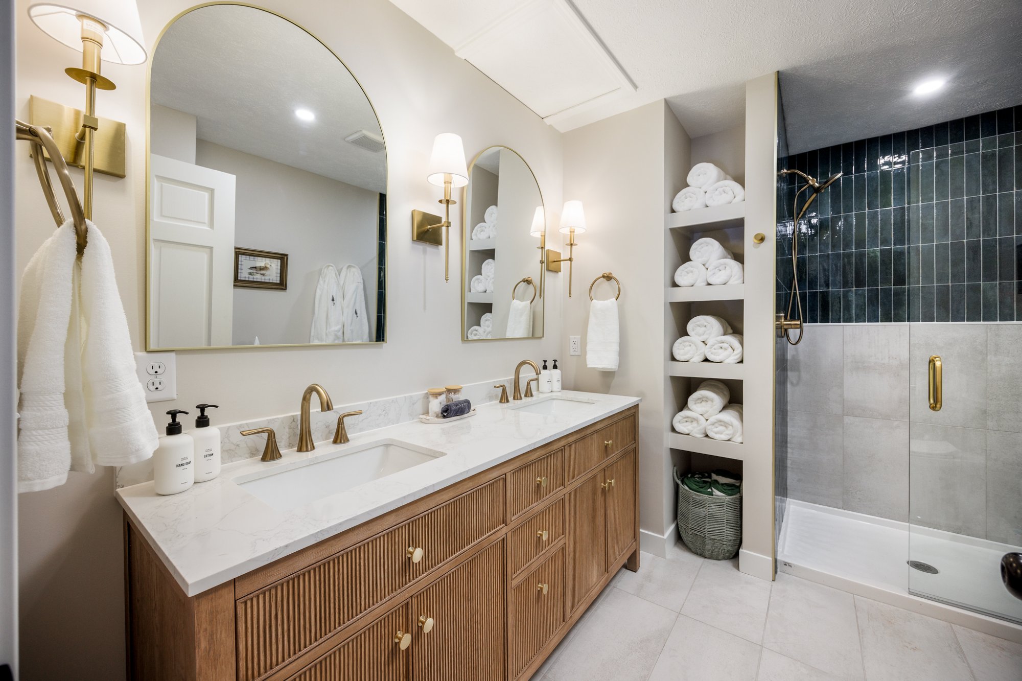 Main bath with dark tile shower