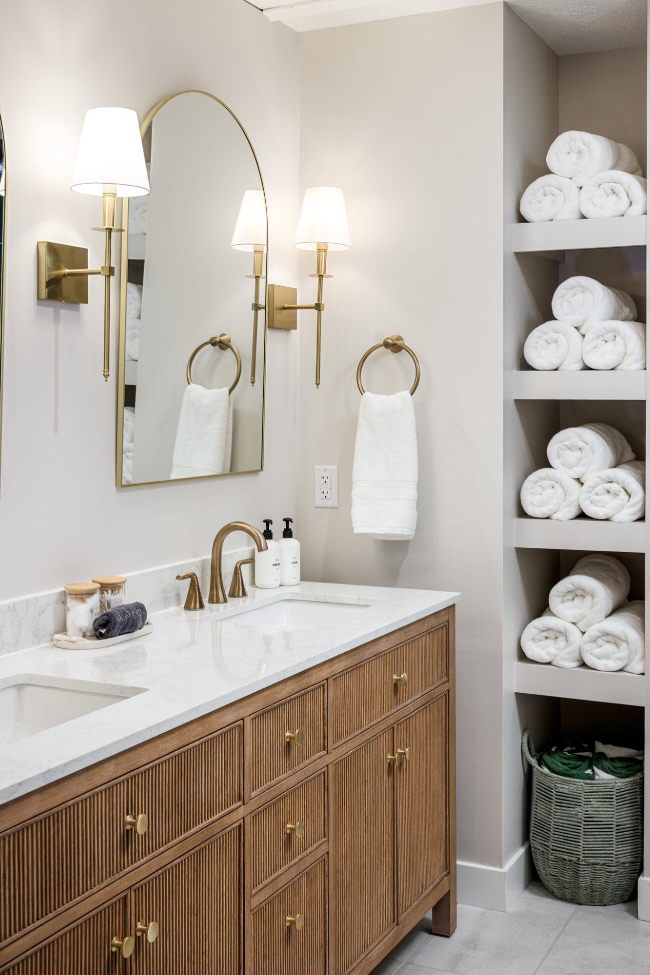 Wood vanity with gold fixtures